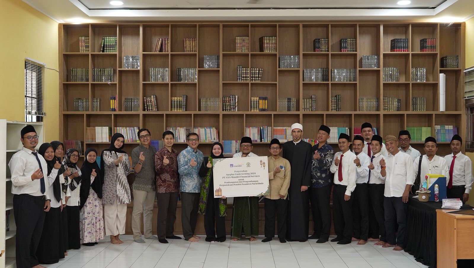 AXA Mandiri Serahkan Surplus Underwriting 2024 ke Baznas dan Disalurkan ke Pondok Pesantren Nurul Huda, Bekasi